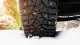 car-studded-tire-in-snow-1731093917.jpg