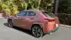 2025-lexus-ux300h-rear-quarter-1733419202.jpeg