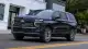 2025-chevrolet-suburban-high-country-driving-front-3qtr-1745853632.jpg