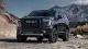 2025-gmc-yukon-denali-ultimate-front-3qtr-1745853635.jpg