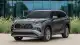 2025-toyota-highlander-hybrid-front-quarter-1745853613.jpg