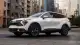 2025-kia-sportage-sx-white-front-3qtr-1748438403.jpg
