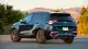 2025-kia-sportage-hybrid-rear-left-3qtr-1749846006.jpg