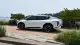 2026-kia-2026-kia-ev4-left-profile-1750339503.jpg